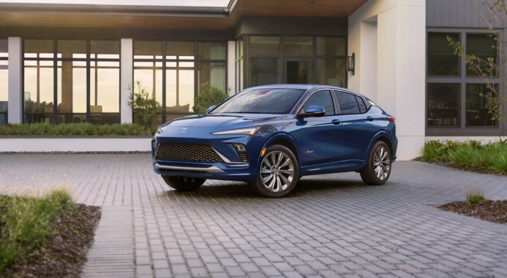 A blue 2025 Buick Envista Avenir parked off-road for sale