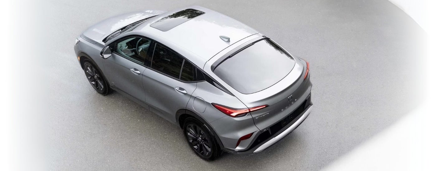 A silver 2025 Buick Envista parked on pavement.
