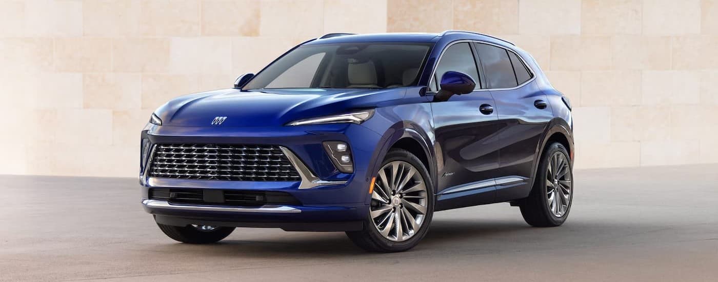A blue 2025 Buick Envision parked after visiting a Buick dealer near Rowlett.
