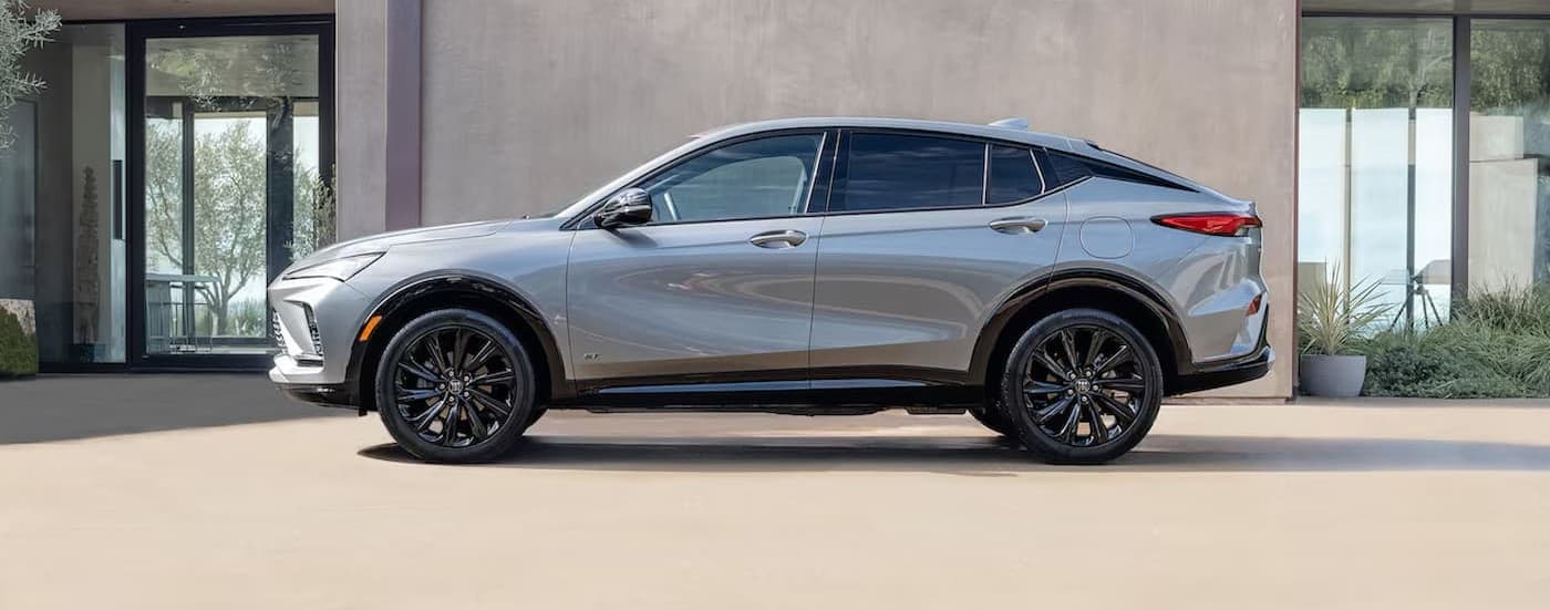 A silver 2025 Buick Envista parked on a driveway..