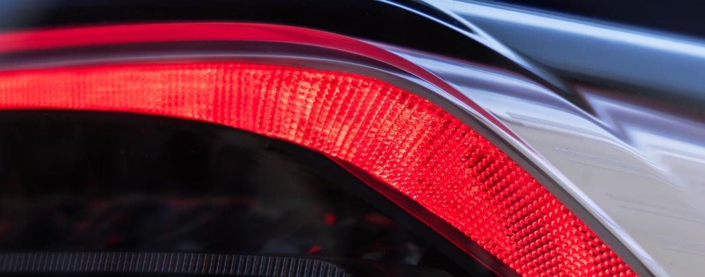 Exterior detail on a silver 2024 Buick Envision.