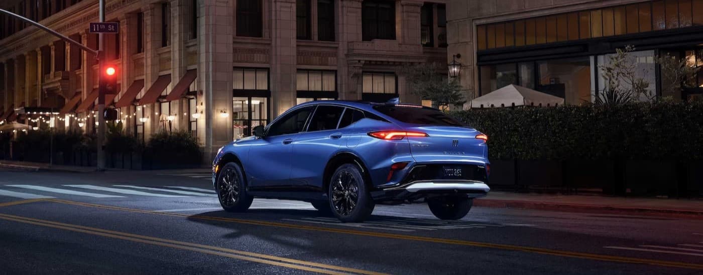 A blue 2026 Buick Envista driving to a Buick dealer near Mesquite.