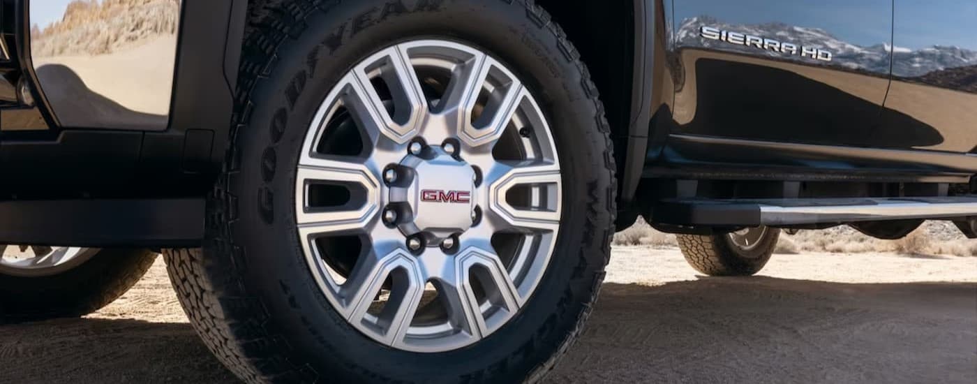 Close-up of a wheel on a 2024 GMC Sierra 2500HD.