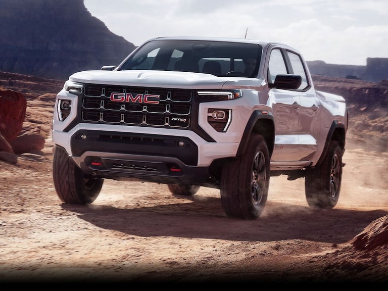 The GMC Canyon Driving Through the Desert